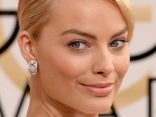 BEVERLY HILLS, CA - JANUARY 12: Actress Margot Robbie attends the 71st Annual Golden Globe Awards held at The Beverly Hilton Hotel on January 12, 2014 in Beverly Hills, California. (Photo by Jason Merritt/Getty Images) annettepix