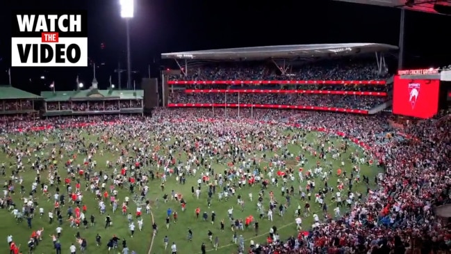 Crowd invades pitch after Buddy Franklin scores 1,000th goal