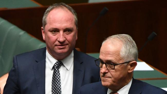 Deputy Prime Minister Barnaby Joyce and Prime Minister Malcolm Turnbull during a motion to suspend standing orders in the House of Representatives at Parliament House in Canberra, Thursday, February 15, 2018. (AAP Image/Mick Tsikas) NO ARCHIVING