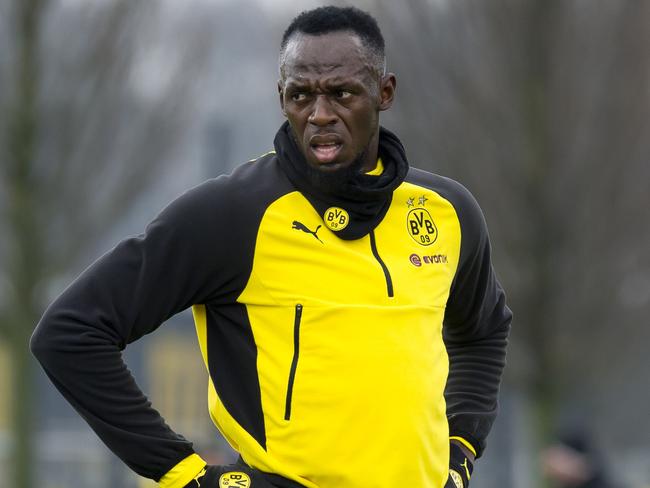 DORTMUND, GERMANY - MARCH 23: Usain Bolt looks on during a training session on March 23, 2018 in Dortmund, Germany. (Photo by TF-Images/TF-Images via Getty Images)
