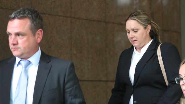 Police officers Russell Thorley and Kristy lee O’connor leave Melbourne Magistrates Court. Picture: David Crosling