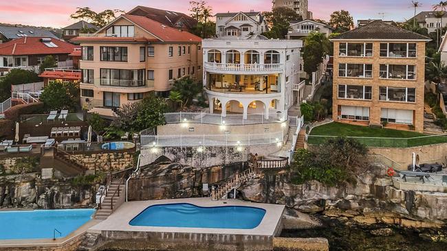 A white house at 30a Addison Rd, Manly is for sale with a guide of $16m but most interested parties want to redevelop the site.