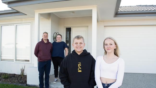 Neale Pretorius with his wife Esther and children at their home in Bisinella's Lara Lakes Estate.