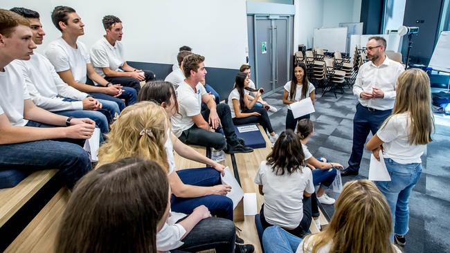 Leader editor in chief Andrew Rennie talks with some of the school captains. Picture: Tim Carrafa