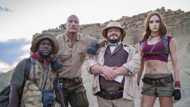 Kevin Hart, Dwayne Johnson, Jack Black and Karen Gillan in a scene from the movie Jumanji: The Next Level. Supplied by Sony Pictures.