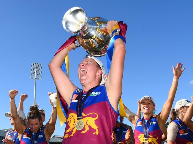 MELBOURNE, AUSTRALIA - DECEMBER 03: Dakota Davidson of the Lions celebrates with the premiership Cup during the AFLW Grand Final match between North Melbourne Tasmania Kangaroos and Brisbane Lions at Ikon Park, on December 03, 2023, in Melbourne, Australia. (Photo by Quinn Rooney/Getty Images) *** BESTPIX ***