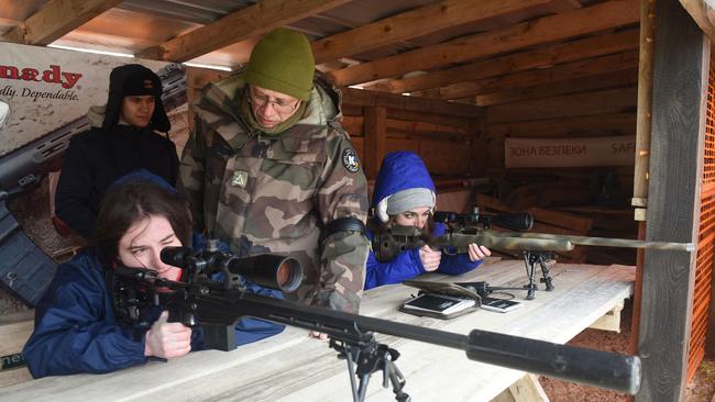 People take part in a shooting training course outside Lviv this week. Picture: AFP