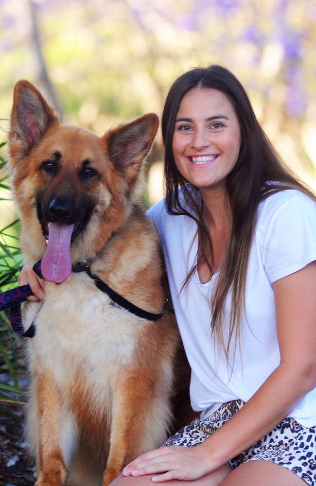 Amy Sommerville from Queensland with Django, who underwent costly chemotherapy.