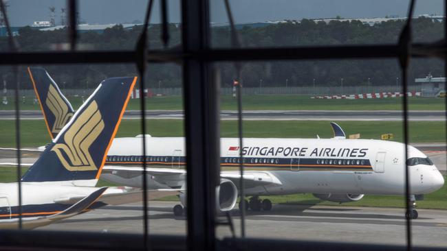 A Singapore Airlines passenger jet taxis along the tarmac at Changi International Airport terminal in Singapore. Picture: AFP