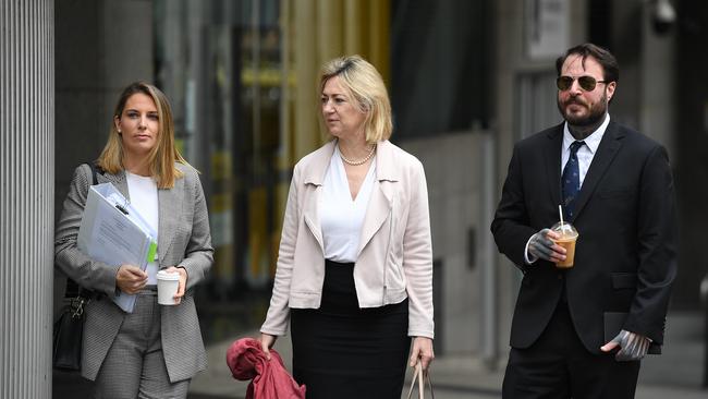 Howard Rollins arrives at the Downing Centre District Court in Sydney with his solicitor Lauren MacDougall and barrister Margaret Cunneen SC. Picture: AAP