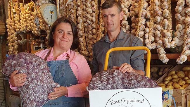 Georgie Dragwidge, of Georgie's Harvest, with East Gippsland garlic grower Justin Dykes.