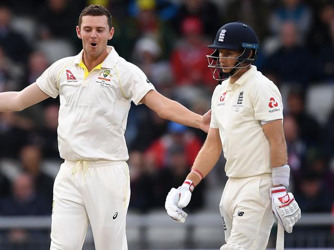 MANCHESTER, ENGLAND - SEPTEMBER 06: Josh Hazlewood of Australia celebrates dismissing England captain Joe Root during day three of the 4th Specsavers Ashes Test between England and Australia at Old Trafford on September 06, 2019 in Manchester, England. (Photo by Gareth Copley/Getty Images)