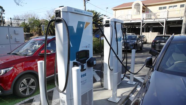 A quiet place needed for waiting? Electric cars being charged in Collingwood. Picture: NCA NewsWire / David Crosling