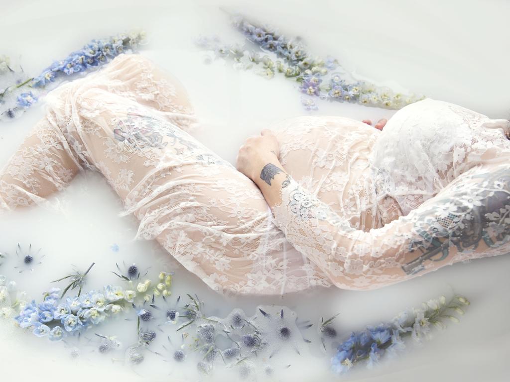 Melinda Manning in a floral milk bath. Picture: Shannon Smith