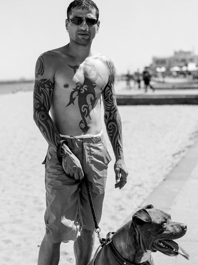 Andrew Veniamin with his dog Tag on St Kilda Beach in 2002. Picture: Alex Coppel