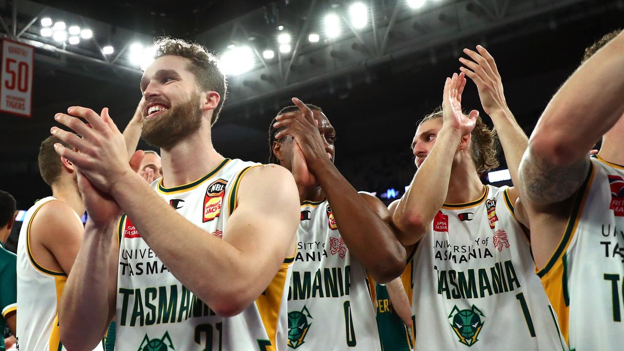 JackJumpers players celebrate the semi-final win.