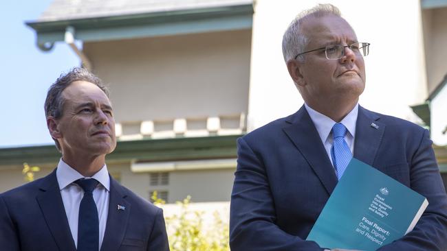 Scott Morrison and Greg Huspeak to reporters. Picture: Getty Images.