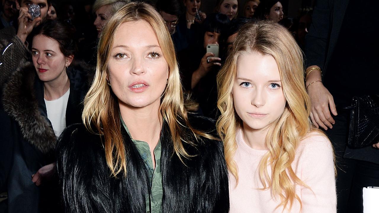 LONDON, ENGLAND - FEBRUARY 16: Kate Moss and Lottie Moss attend the Topshop Unique show at London Fashion Week AW14 at Tate Modern on February 16, 2014 in London, England. (Photo by David M. Benett/Getty Images for Topshop)