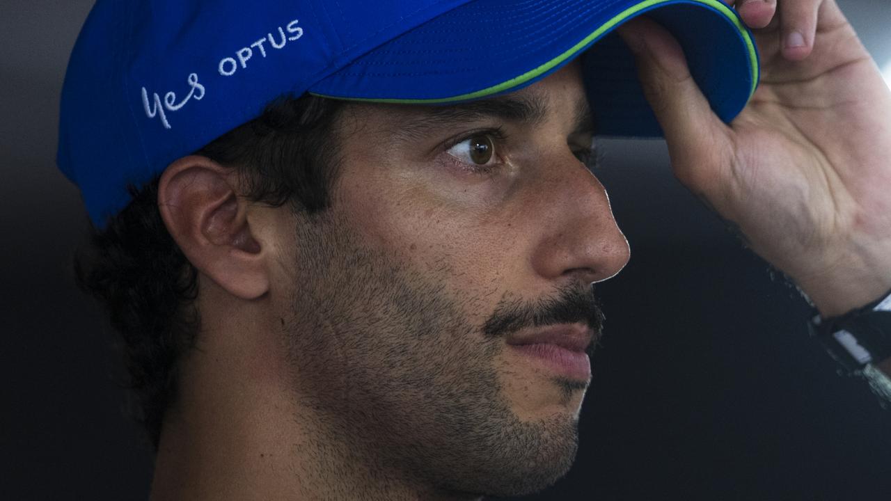 BUDAPEST, HUNGARY - JULY 20: 9th placed qualifier Daniel Ricciardo of Australia and Visa Cash App RB talks to the media after qualifying ahead of the F1 Grand Prix of Hungary at Hungaroring on July 20, 2024 in Budapest, Hungary. (Photo by Rudy Carezzevoli/Getty Images)