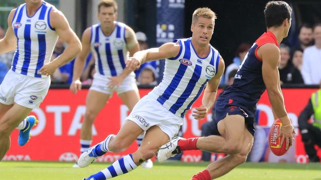 Andrew Swallow giving chase against Melbourne. Picture: AAP