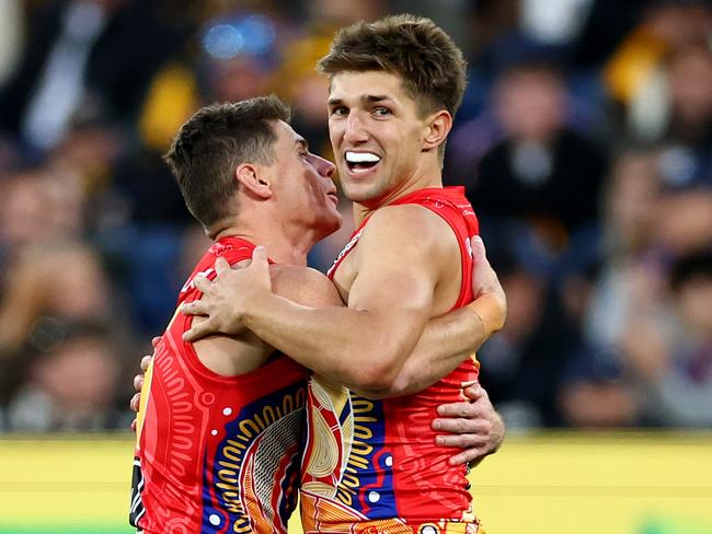 Dayne Zorko (left) and Zac Bailey (right) are two of Mick McGuane’s seven A-grade players from Brisbane. Picture: Josh Chadwick / Getty Images