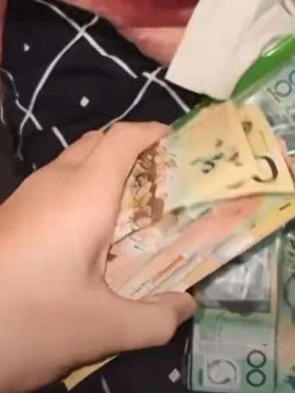 Gino Pacino with another pile of cash on a different video. Picture: TikTok