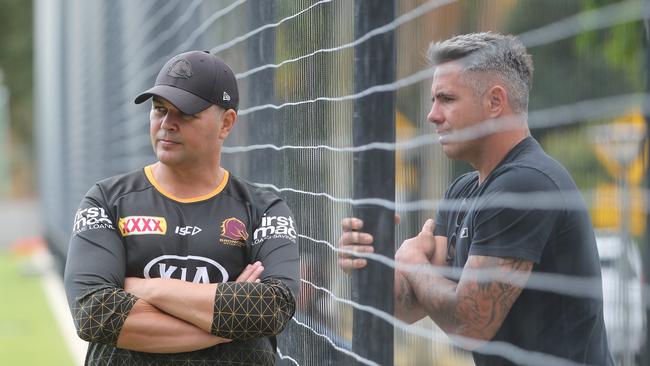 Former Broncos coach Anthony Seibold and club legend Corey Parker were only allowed to speak through a fence last year. Pic Peter Wallis