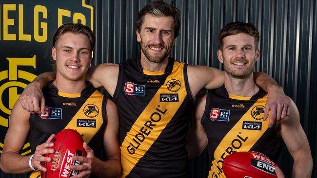 21.09.23 - SANFL finals: Glenelg's Archie Lovelock, Max Proud, and Jonty Scharenberg at Glenelg Oval. They have a special family connection. Picture: Naomi Jellicoe