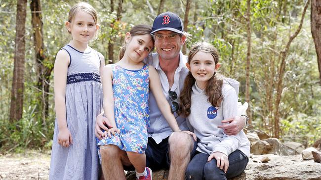 The Premier with three of his six children: Charlotte, 12, Amelia, 10, and Annabelle, 7. Picture: Tim Hunter