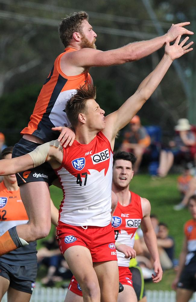 Northcote Park signing Kyle Galloway contests a ruck hitout against Dawson Simpson in the NEAFL. Picture: Simon Bullard.