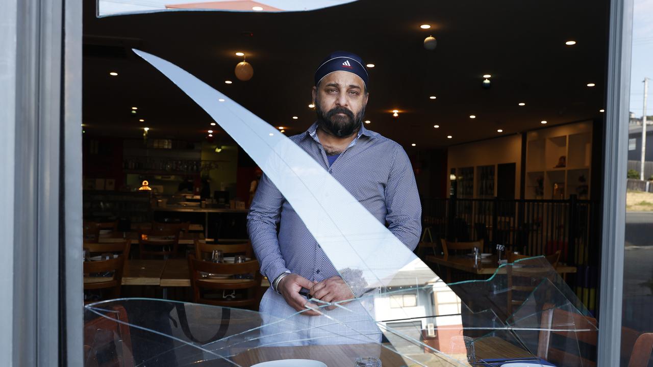 Jarnail 'Jimmy' Singh owner of Dawat The Invitation Indian restaurant at Bellerive who arrived at the restaurant to find one of it's windows had been smashed in. He has experienced similar incidents in the past. Picture: Nikki Davis-Jones