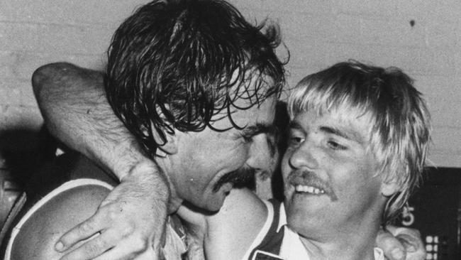 Jeff Sarau and Trevor Barker celebrate after a St Kilda win.