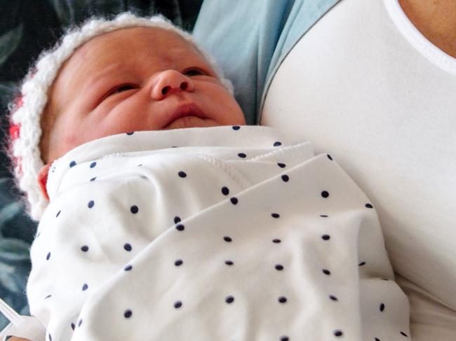 Baby Bowie Harris, born at 6.20am at the Women's & Children's, with dad Daniel Harris and mum Agi Magyar, Wednesday, December 25, 2019. (AAP Image/ Morgan Sette)