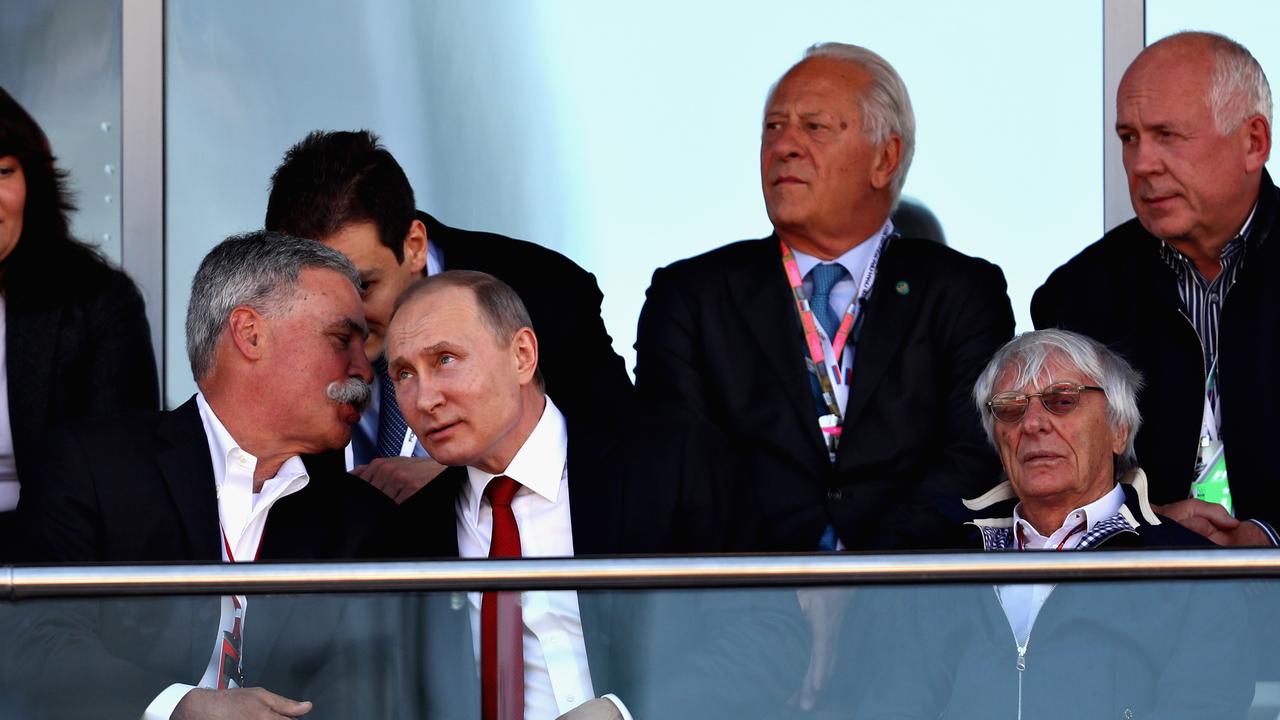 Chase Carey, Formula 1 CEO, talks with President of Russia Vladimir Putin and Bernie Ecclestone. Photo by Clive Mason/Getty Images.