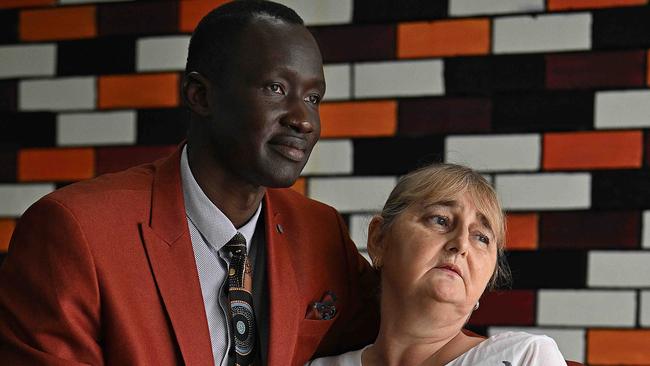 Vyleen White's daughter, Cindy Micallef with President of the Queensland African Communities Council (QACC) Beny Bol. Pic: Lyndon Mechielsen/Courier Mail