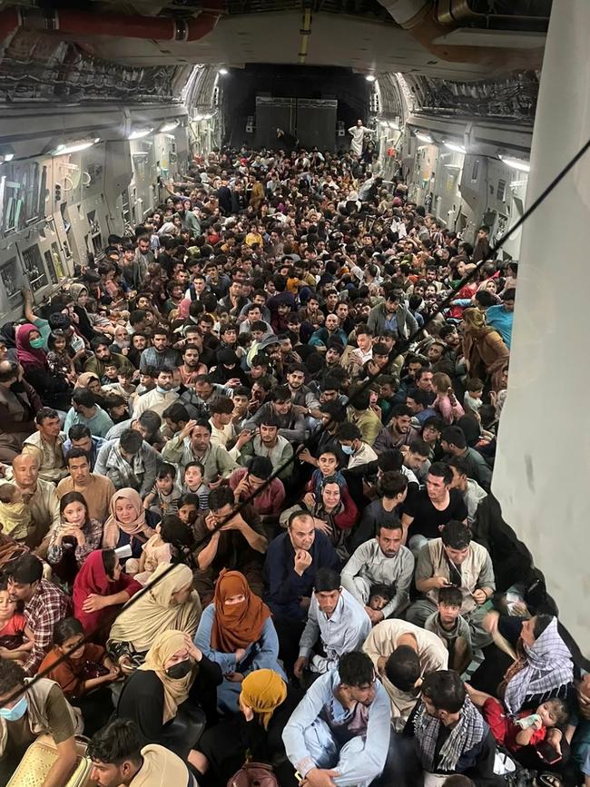 About 640 Afghan evacuees head to Qatar on a US Air Force C-17 Globemaster III transport aircraft om Tuesday. Picture: Reuters