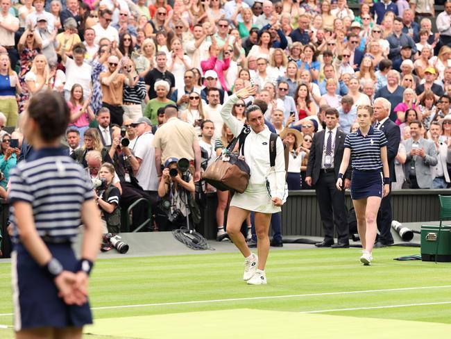 LONDON, ENGLAND - JULY 15: The crowd applauds Ons Jabeur of Tunisia as she leaves the court following her defeat in the Women's Singles Final against Marketa Vondrousova of Czech Republic on day thirteen of The Championships Wimbledon 2023 at All England Lawn Tennis and Croquet Club on July 15, 2023 in London, England. (Photo by Julian Finney/Getty Images)