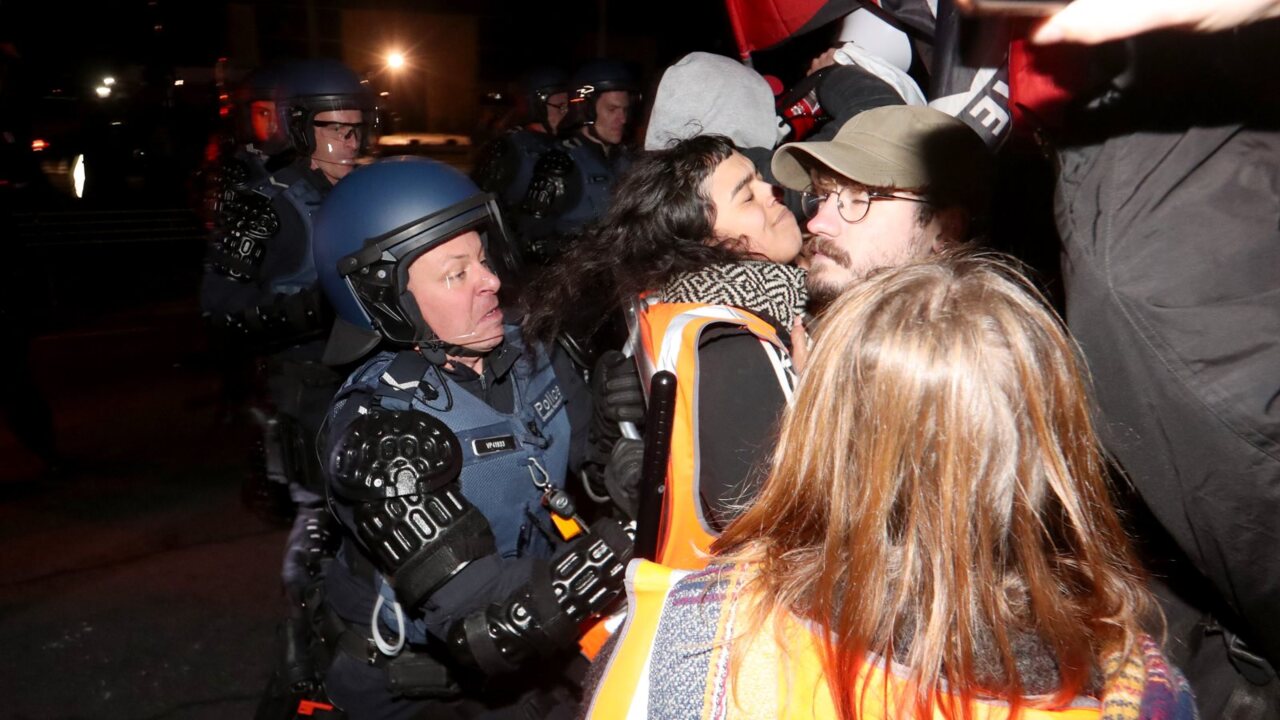 Police and protestors clash outside Lauren Southern event