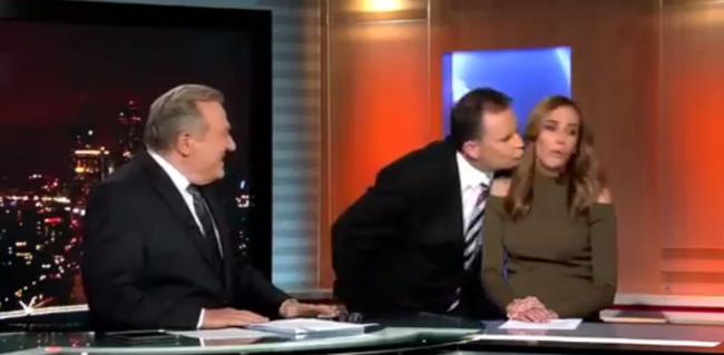 Rebecca Judd turns away from colleague's kiss.