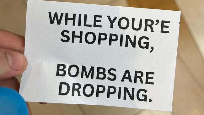 Pro-Palestinian protesters are distributing flyers as part of their protest Picture: Twitter