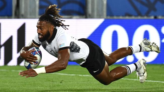 Waisea Nayacalevu dives over to score a try for Fiji. Picture: AFP