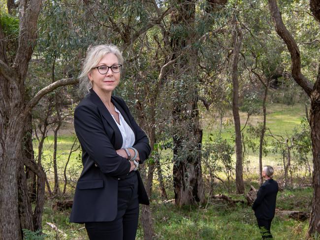 Detective Senior Constable Maria Feher stands close to where the bones and skull were found in bushland at St Helens Park. Picture: Monique Harmer