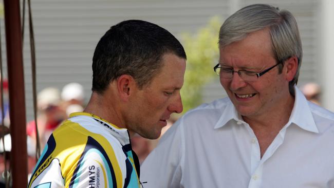 Then prime minister Kevin Rudd speaks to Lance Armstrong after the first stage of the Tour Down Under at Mawson Lakes in 2009.