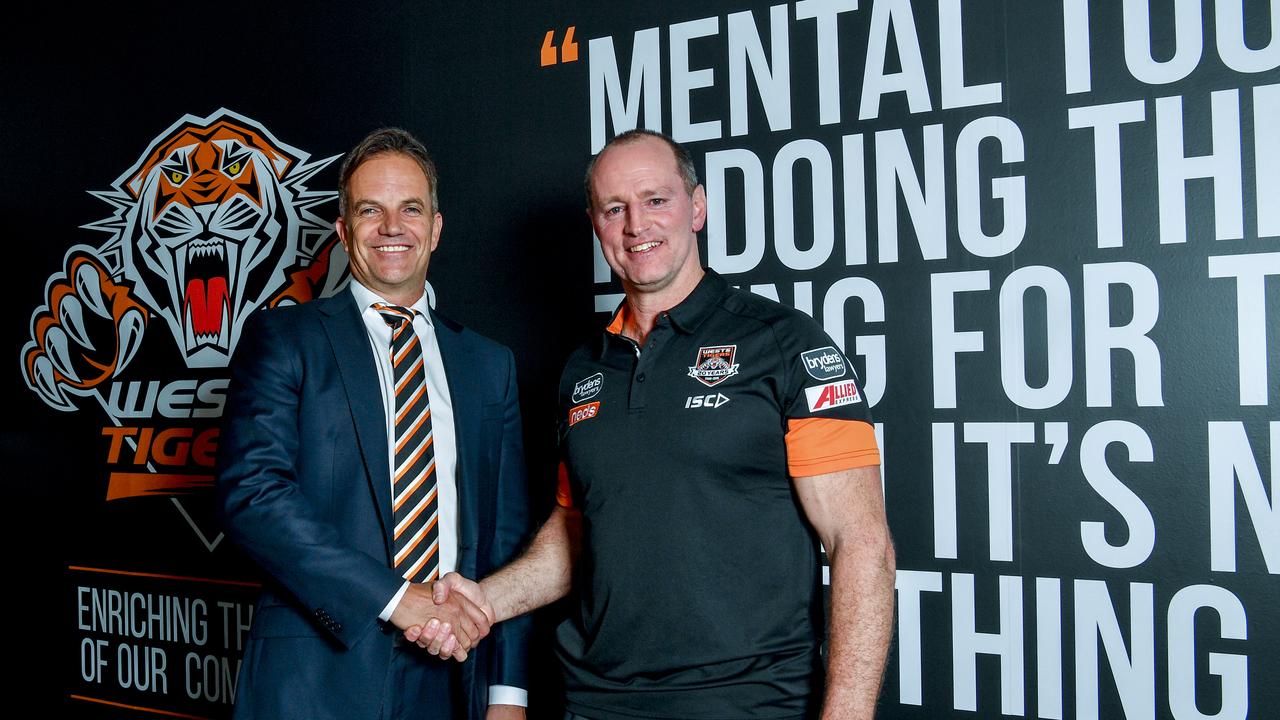 Wests Tigers' CEO Justin Pascoe (left) after signing Michael Maguire as coach.