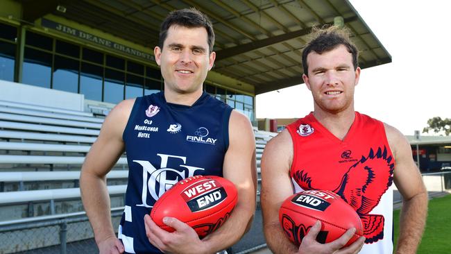 Noarlunga FC Captain Tom Caudle and Flagstaff Hill FC Captain Michael Shearerpose for a photograph at Hickinbotham Oval, Noarlunga, Adelaide on Monday the 18th of September 2017. The two teams will take on each other at the Southern Football League Grand Final on Saturday, September 23. (AAP Image/ Keryn Stevens)