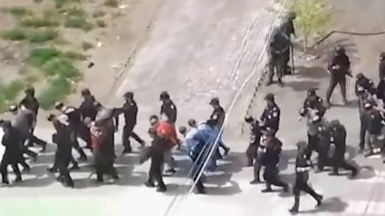 The men were blindfolded and shackled. Picture: YouTube