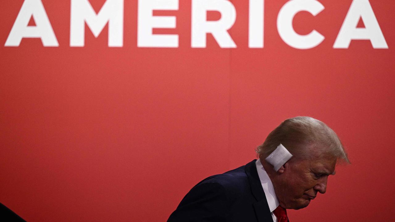 US former President and 2024 Republican presidential candidate Donald Trump is seen with a bandage on his ear after being wounded in an assassination attempt. Picture: Brendan Smialowski/AFP