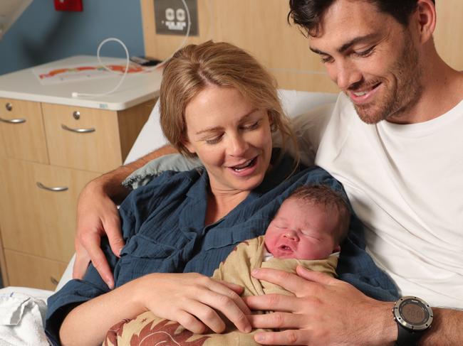 Sam Taylor and Eliza Jorgensen from Burleigh Heads  with their newborn son, August Van Taylor , who was born in a hurry on New Years morning at Gold Coast University Hospital. Picture Glenn Hampson