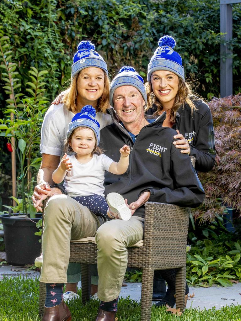 Jan and Neale Daniher and his granddaughter Rosie, 1 and daughter Bec. Picture: Tim Carrafa