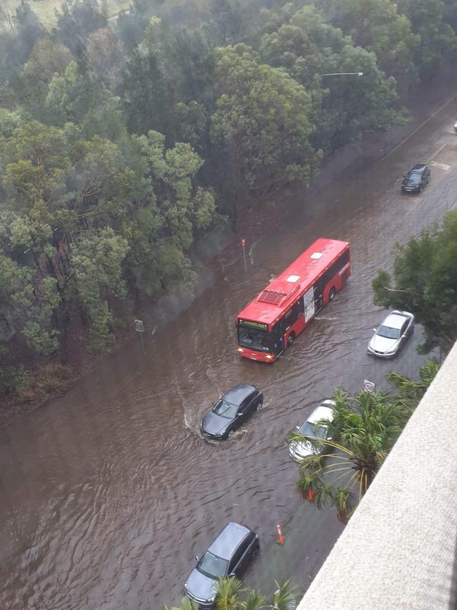 Traffic on a waterlogged Hill Rd. Picture: Lee Williams/Facebook